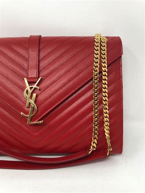 ysl shoulder bag red|YSL shoulder bag with tassel.